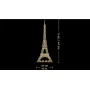 Maquette LEGO de la tour Eiffel dorée sur fond noir avec dimensions : 149 cm de hauteur et 57 cm de largeur à la base