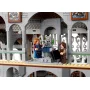Gros plan sur une terrasse de Fondcombe avec trois figurines LEGO dans une architecture elfique aux colonnes et arcs blancs ornementés Gros plan sur une terrasse de Fondcombe avec trois figurines LEGO dans une architecture elfique aux colonnes et arcs blancs ornementés