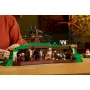Vue d'ensemble du set LEGO la Comté avec maisons de hobbits sous collines vertes, arbre et figurines dans un intérieur cosy Vue d'ensemble du set LEGO la Comté avec maisons de hobbits sous collines vertes, arbre et figurines dans un intérieur cosy