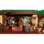 Intérieur d'une maison hobbit LEGO avec Bilbon et Gandalf, porte ronde, cheminée, chandelier et tapis rouge Intérieur d'une maison hobbit LEGO avec Bilbon et Gandalf, porte ronde, cheminée, chandelier et tapis rouge