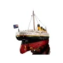 Maquette LEGO du Titanic avec coque rouge, superstructure blanche, quatre cheminées jaunes et pavillon britannique Maquette LEGO du Titanic avec coque rouge, superstructure blanche, quatre cheminées jaunes et pavillon britannique