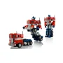 Vue d'ensemble du set LEGO Optimus Prime montrant la transformation du camion rouge et bleu en robot, avec les trois étapes visibles Vue d'ensemble du set LEGO Optimus Prime montrant la transformation du camion rouge et bleu en robot, avec les trois étapes visibles