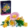 Boîte LEGO Botanicals et bouquet construit avec marguerite rose, tulipes jaunes, narcisses blancs et feuillage vert