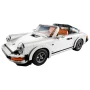 Modèle LEGO Porsche 911 blanc décapotable avec intérieur orange et noir, phares ronds et jantes emblématiques sur fond blanc Modèle LEGO Porsche 911 blanc décapotable avec intérieur orange et noir, phares ronds et jantes emblématiques sur fond blanc