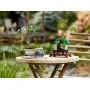 LEGO Bonsai tree with green foliage on wooden stand, displayed on round wooden table next to real potted bonsai plant LEGO Bonsai tree with green foliage on wooden stand, displayed on round wooden table next to real potted bonsai plant