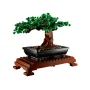 LEGO Bonsai with dense green foliage, twisted brown trunk in black rectangular pot on brown wooden display stand LEGO Bonsai with dense green foliage, twisted brown trunk in black rectangular pot on brown wooden display stand