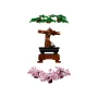 LEGO Bonsai with green foliage, curved brown trunk in black pot on wooden base, and separate pink cherry blossom branch LEGO Bonsai with green foliage, curved brown trunk in black pot on wooden base, and separate pink cherry blossom branch