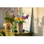 LEGO wildflower bouquet with colorful flowers in pink vase on golden table, natural light casting shadows on wall LEGO wildflower bouquet with colorful flowers in pink vase on golden table, natural light casting shadows on wall